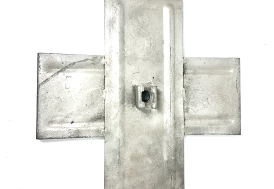Cross plate earth anchor for drilled hole guy anchoring